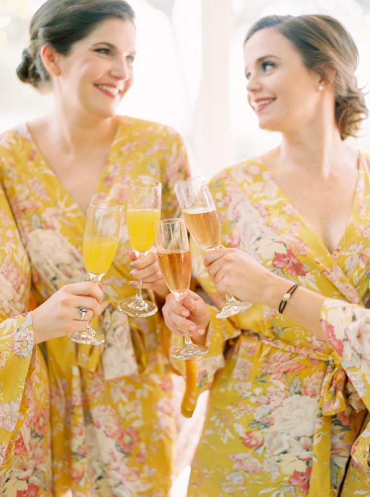 Bride and her Bridesmaids in yellow Pretty Plum Sugar floral robes