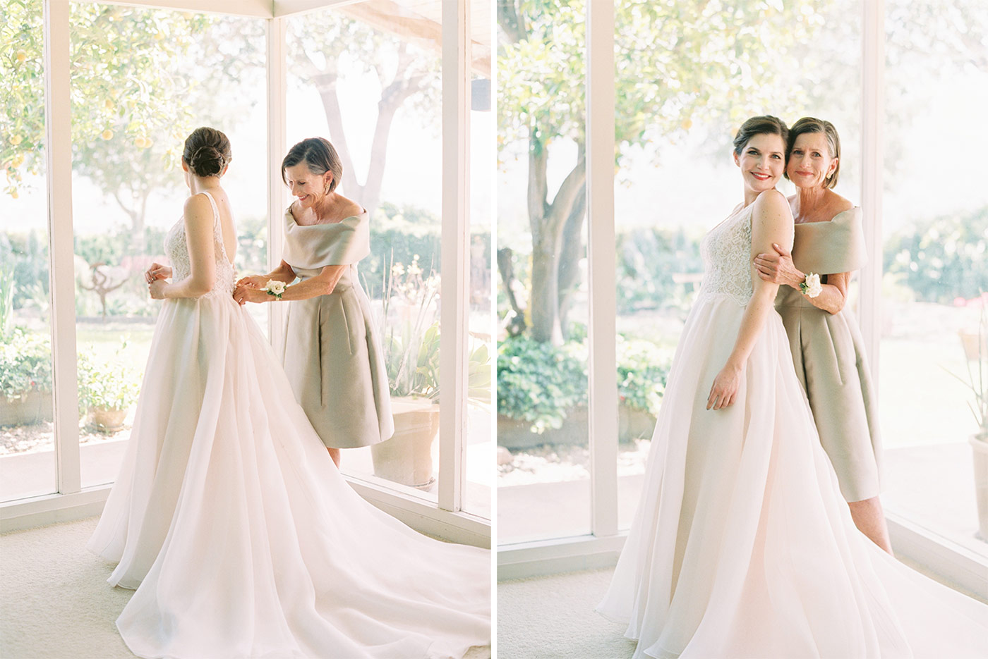 Bride and her Mother zipping up her wedding dress