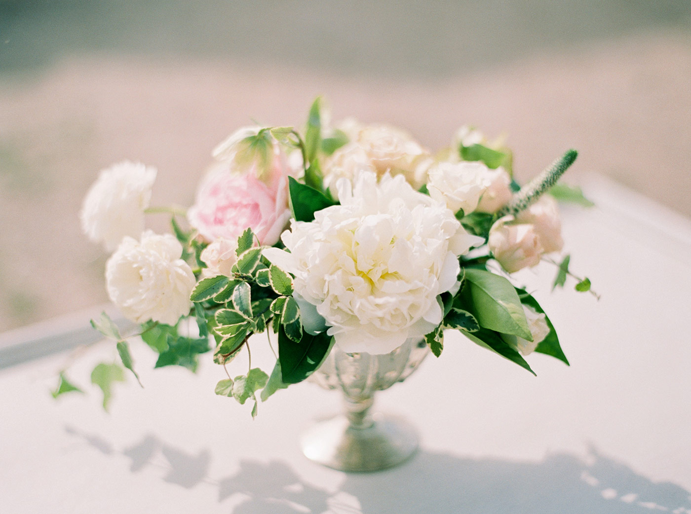 White, Pink and Green Floral Arrangement by Noonan's Wine Country Designs